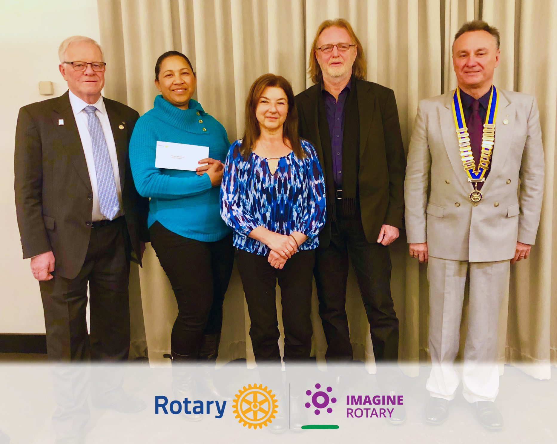 Padstow Rotary donation cheque _presenation to the Trilogy Foundation CB - June 28 - 2022 - copy